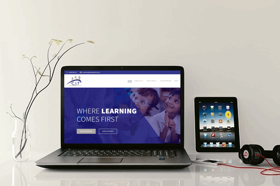 cropped-CIT-website-homepage.png a laptop open showing the CIT website home page