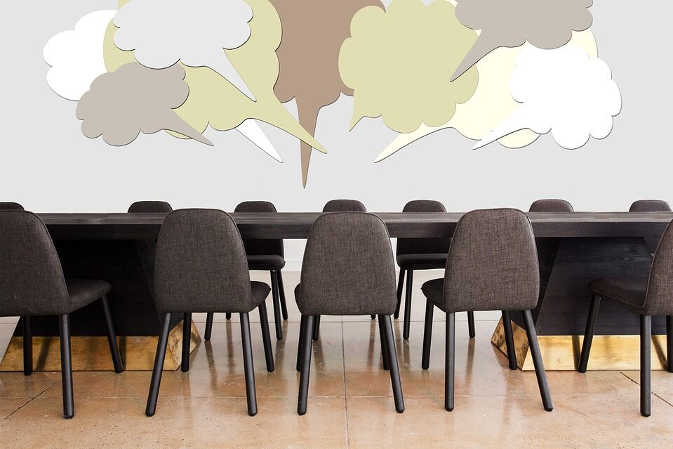 cropped-conference-1886023_960_720.jpg a boardroom table and chairs